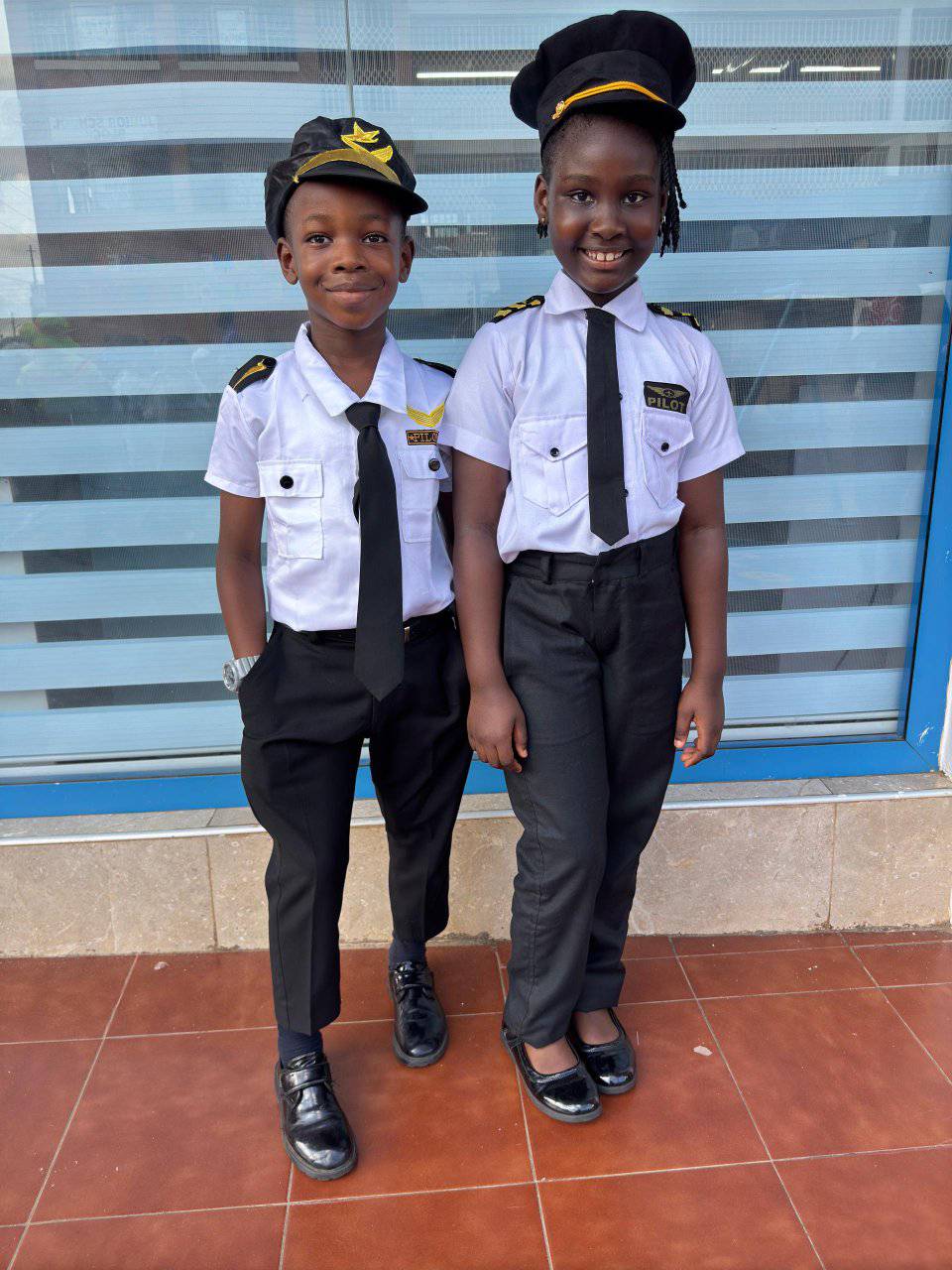 Kindergarten program - young students in pilot uniforms